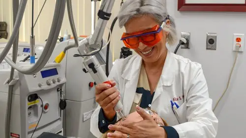 Dr. Pien in our main laser OR using a PICO laser on a patient.