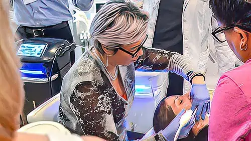 Dr. Pien training other doctors on the use of an automated injection device