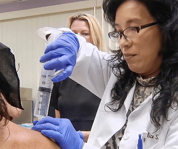 Dr. Pien of AMA RegenMed discusses the procedure as she prepares a large-volume stem cell injection, a key part of our regenerative protocols