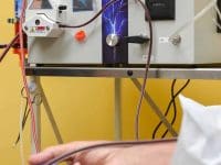 eboo-man-holds-stress-ball-with-device-in-background-extracorporeal-oxygenation-and-ozonation-ama-regenerative-medicine