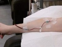 Close-up of the IV line inserted into Randy's arm to begin the Hyperbaric Ozone Therapy for Lyme Disease.