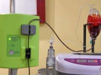 Close-up of Major Autohemotherapy (MAH) setup, showing blood being treated with ozone gas during Scot's DSAP therapy.