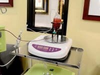 Blood swirling in the apparatus during the Hyperbaric Ozone Therapy (10-Pass) process for patient treatment.